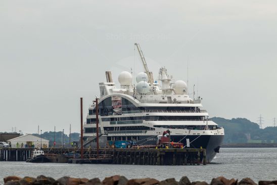 Small cruise ship docked at Farlie on the West Coast of scotland