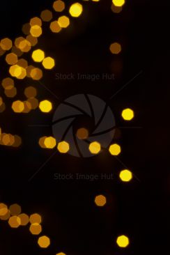 An unusual blurry shot of Christmas lights in the distance image