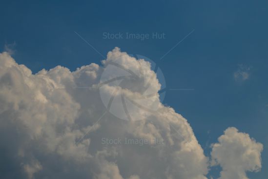 Storm clouds starting to gather on a sunny summer day image