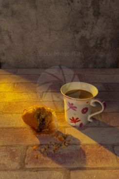 A cup of coffee and a delicious muffin for breakfast