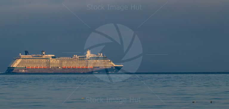 Cruise ship Silhouette catching the morning sun as she heads into port at Greenock, Scotland