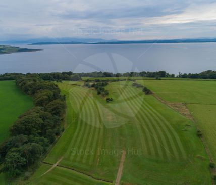 Golf course from a drone with the sea as an amazing backdrop situated on the West Coast of Scotland