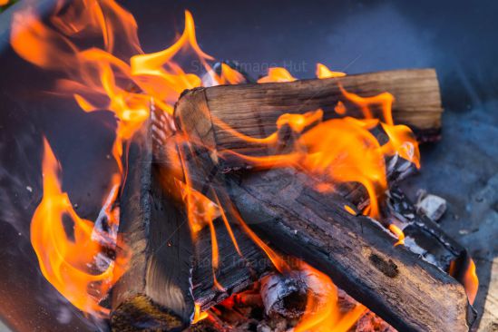 Logs Burning In Firepit