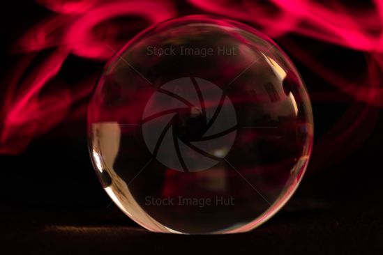 Crystal sphere with fire effect in background image