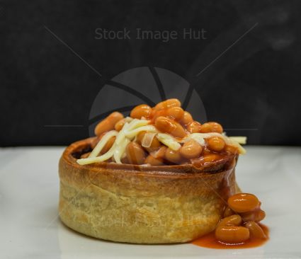 Pie and beans with cheese