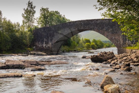 Old stone bridge over river in the Scottish Highlands image