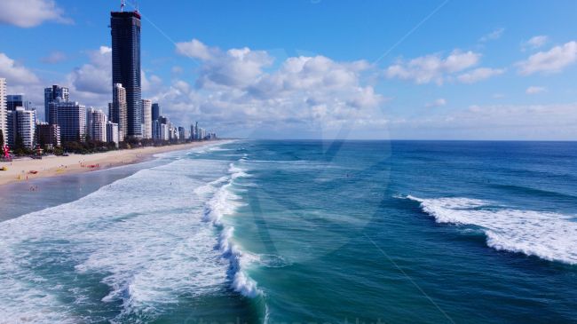 Surfers enjoying fantastic conditions at surfers paradise in Queensland, Australia